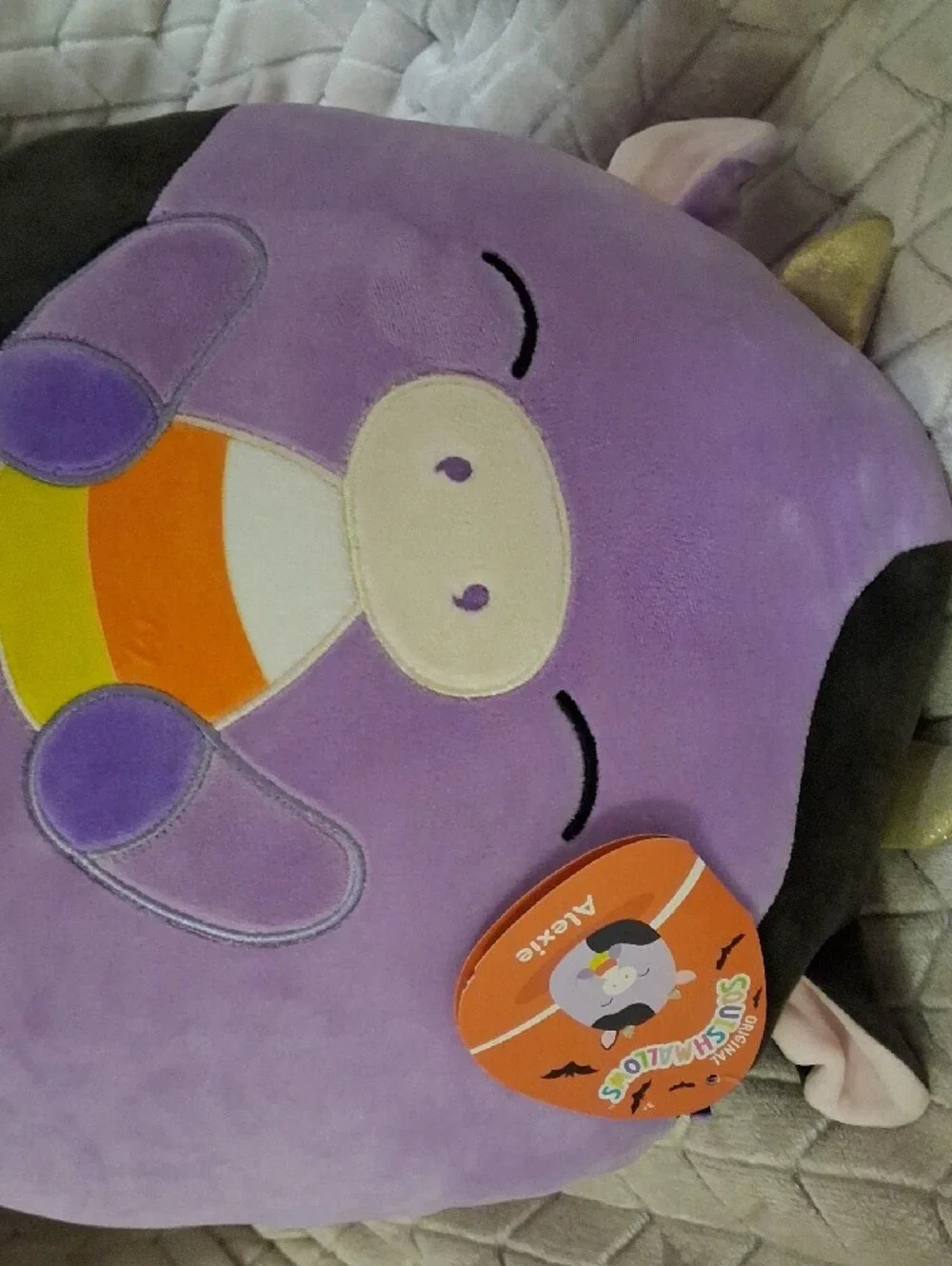 Squishmallow-Alexie, The purple Halloween Cow.